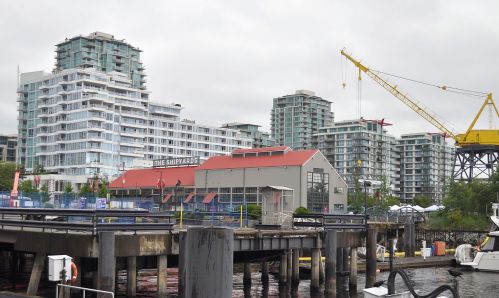 The Lower Lonsdale waterfront. The restored yellow crane is decorative.